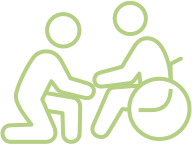 Icon of caregiver assisting a person in a wheelchair, symbolizing care and support.